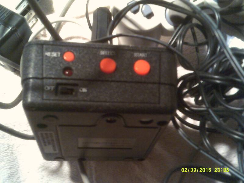 lot 34 image: PLAY STATION CONTROLLERS AND 1 ATARI