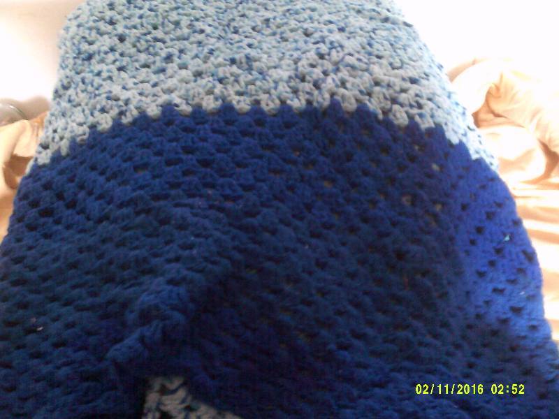 lot 35 image: 2 TONED KNITTED AFGAN