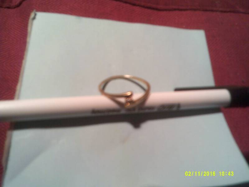 lot 80 image: SZ 8 GOLD BAND WITH DIAMOND