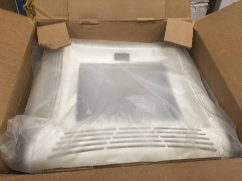lot 36 image: NuTone 50 CFM Ceiling Exhaust Bath Fan with Light open box in new condition