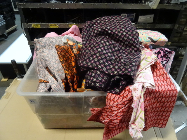 Bin full of misc dog scarfs. Fabric...