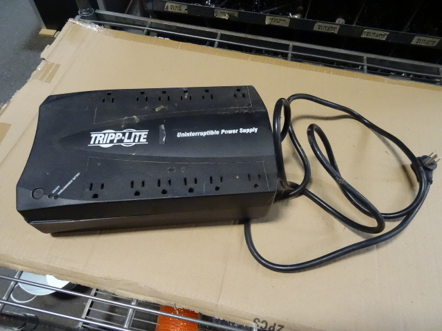 Tripp lite uninterruptible power su...
