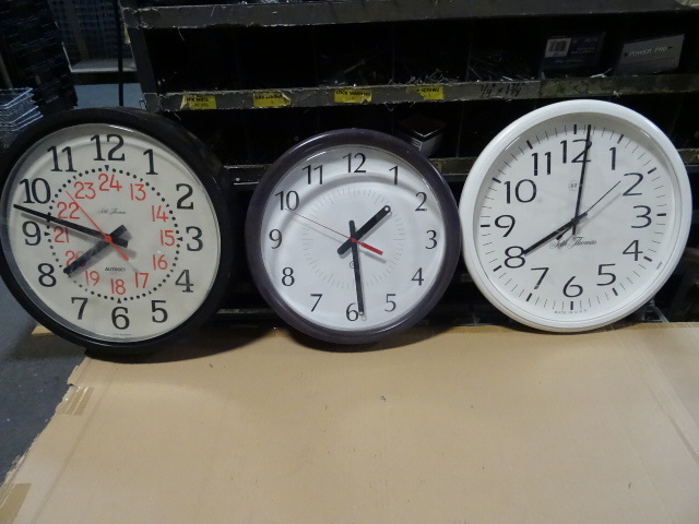 3 wall hanging clocks...