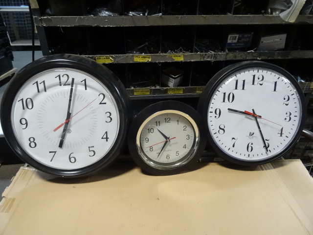 3 wall hanging clocks...