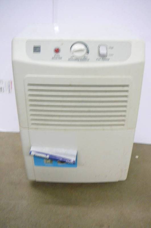 lot 57 image: Kenmore Dehumidifier