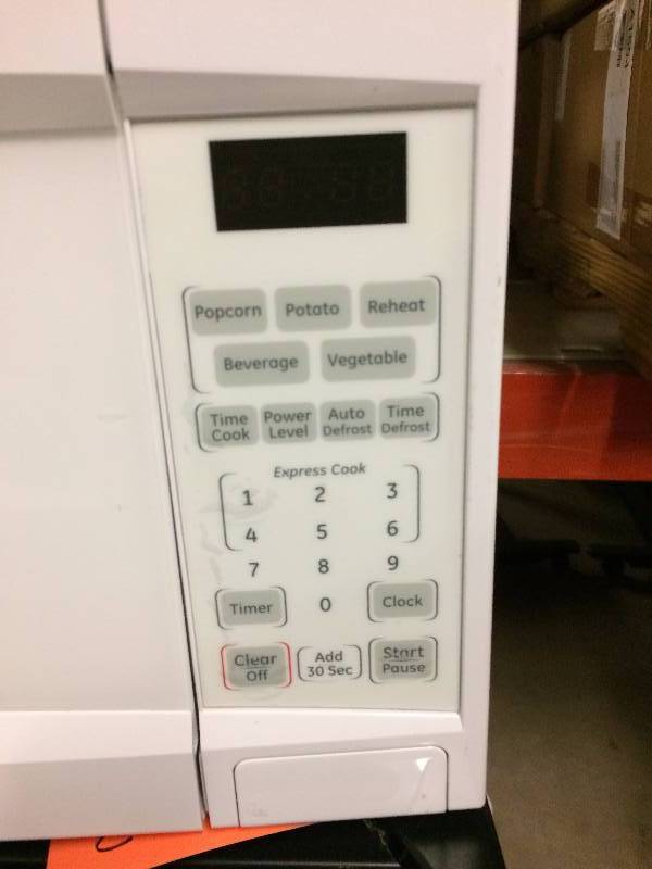 lot 20 image: GE 1100 Watt 1.1 Cu.Ft. White Countertop Microwave Oven - Excellent Working Condition