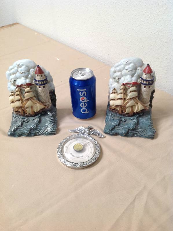 lot 21 image: Ship and Light House Book Ends, with Thermostat Gage