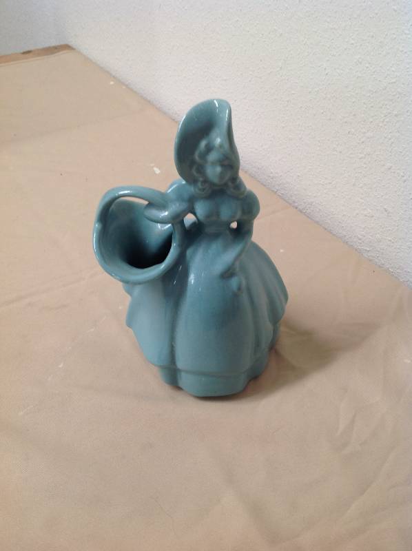 lot 22 image: Sea-foam Green Vintage Lady that holds Flowers