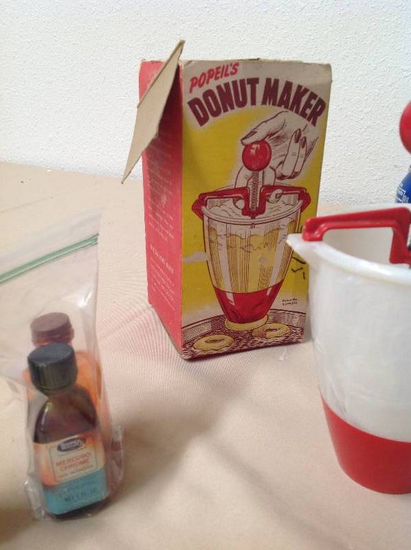lot 55 image: Vintage Donuts Maker With Box, and Three Old Bottles with Liquid inside