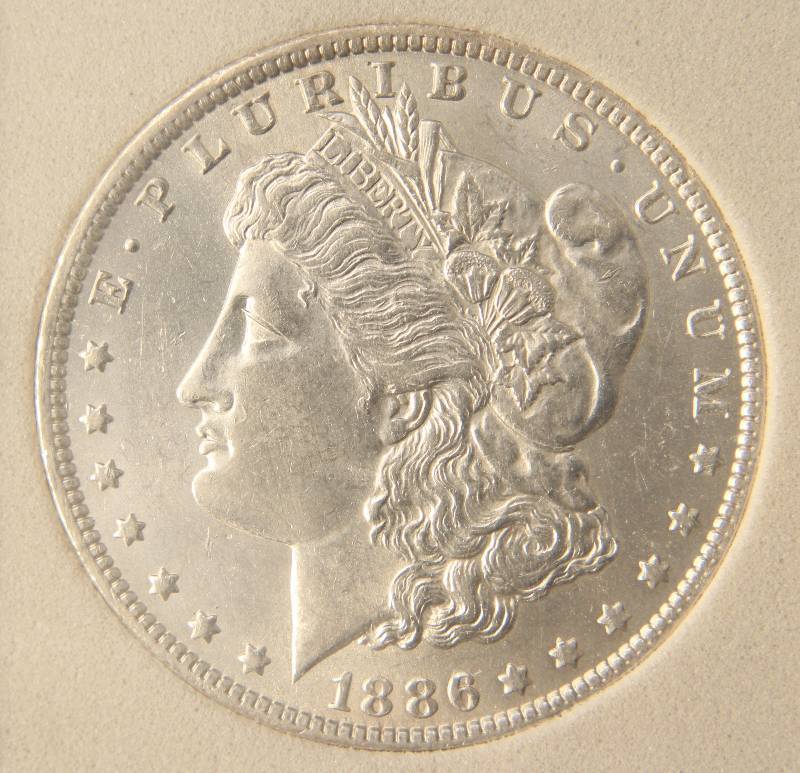 lot 05 image: 1886-O MORGAN SILVER DOLLAR MS64 NCGS