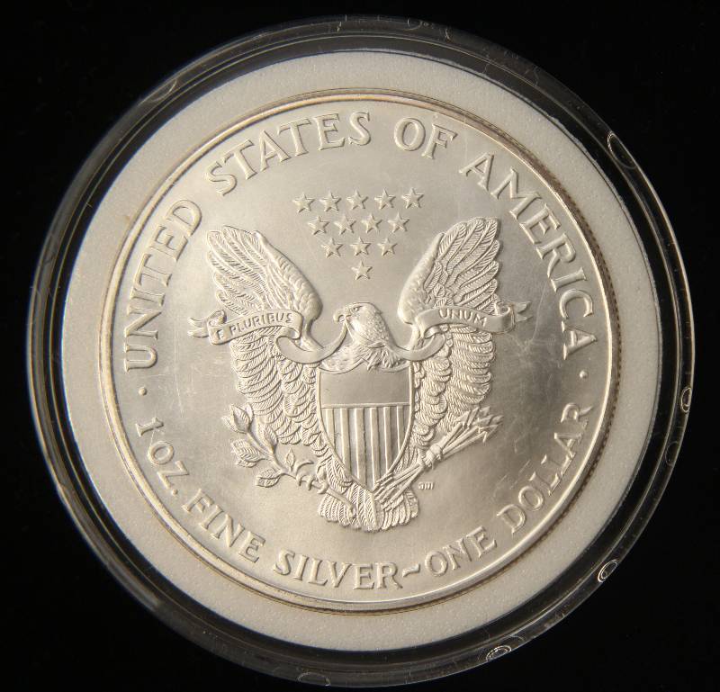 lot 15 image: 1997 AMERICAN SILVER EAGLE 1 TROY OZ. .999 FINE SILVER IN AIRTITE