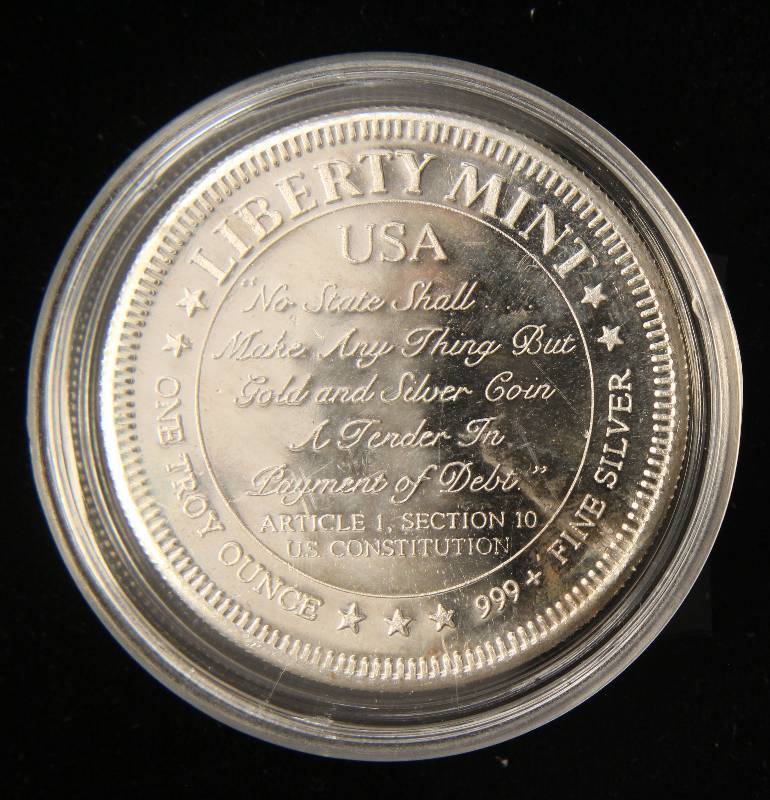 lot 26 image: 1 TROY OZ. .999 FINE SILVER LIBERTY MINT NO STATE SHALL... IN AIRTITE