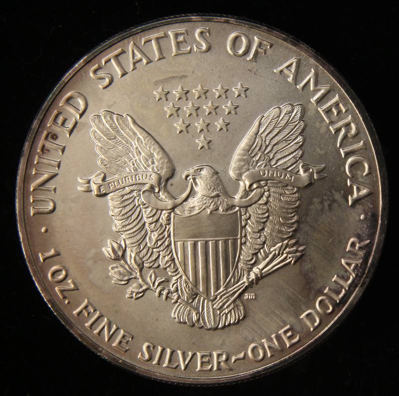 lot 29 image: 1991 AMERICAN SILVER EAGLE 1 TROY OZ. .999 FINE SILVER IN AIRTITE
