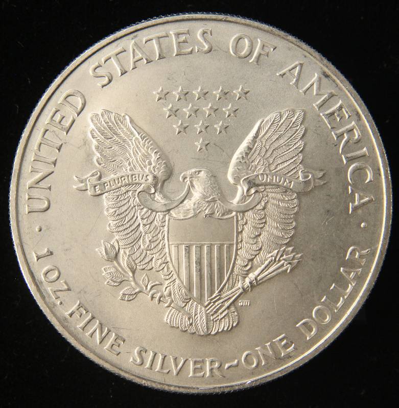 lot 60 image: 1997 AMERICAN SILVER EAGLE 1 TROY OZ. .999 FINE SILVER
