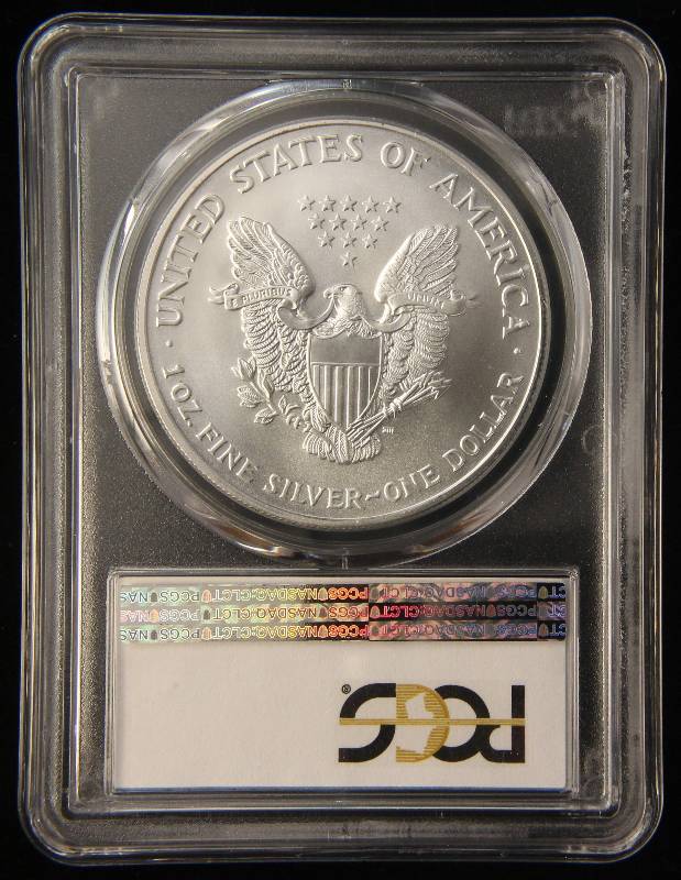 lot 61 image: 2002 AMERICAN SILVER EAGLE 1 TROY OZ. .999 FINE SILVER MS69 PCGS