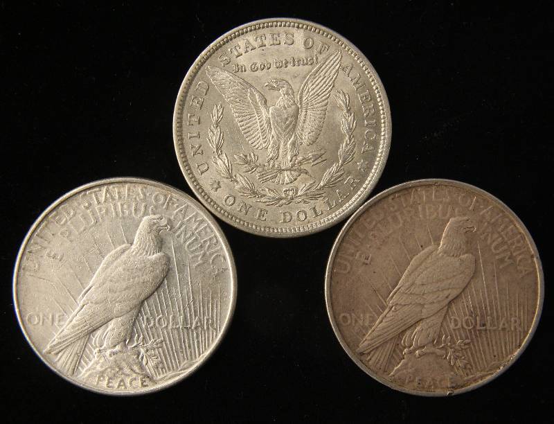 lot 63 image: 3 SILVER DOLLARS 1921 MORGAN, 1922, 1923 PEACE XF-AU