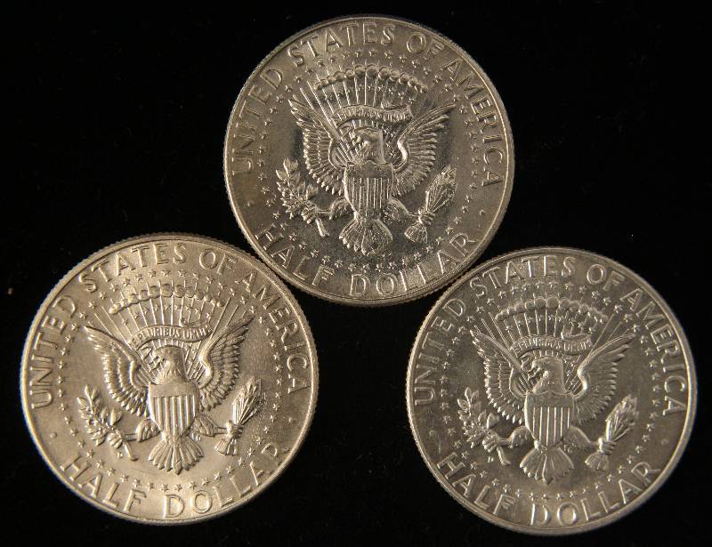 lot 73 image: 3 BU SILVER 1964 KENNEDY HALF DOLLARS