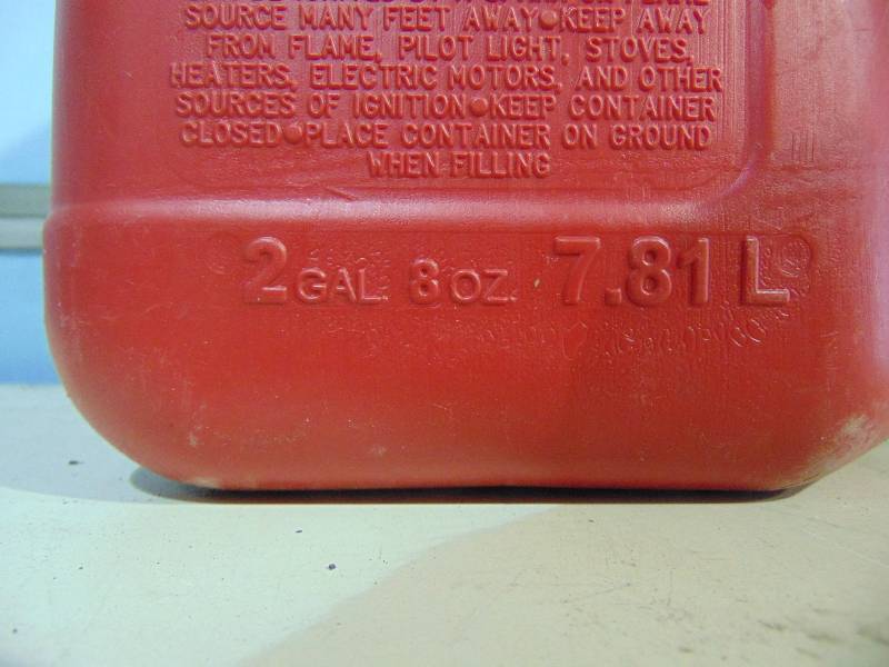 lot 49 image: Gas Can And BMW Oil