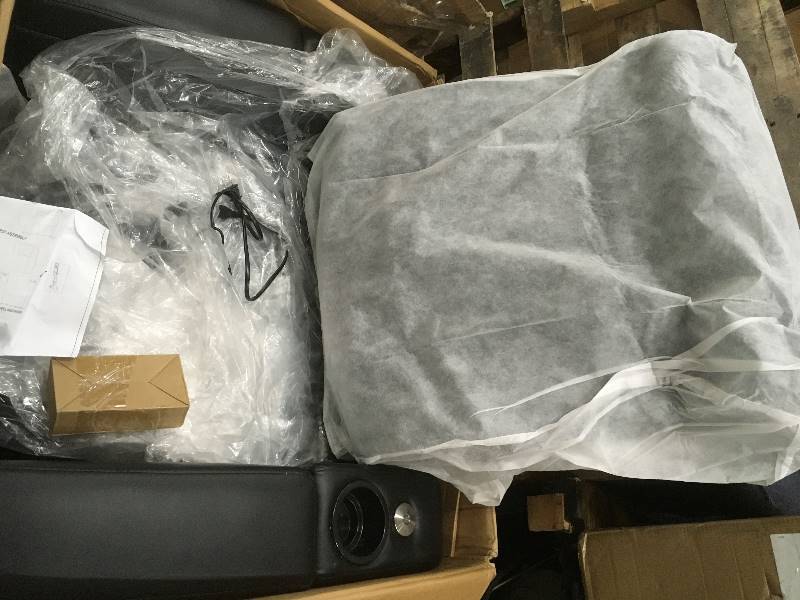 lot 21 image: Abbyson Larson Power Recliner, Black open box never used whit small damage on cord