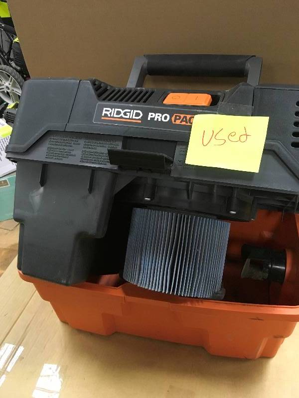 lot 63 image: Ridgid Pro Pack 4.5 Gallon WetDry Vac used in working conditions