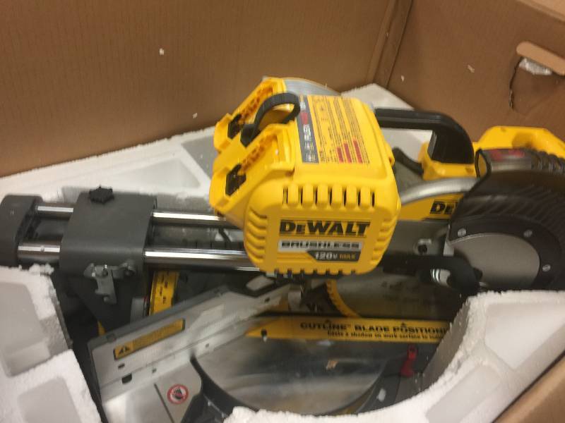 lot 118 image: DEWALT FLEXVOLT 120-Volt MAX Lithium-Ion Cordless 12 in. Double Bevel Sliding Brushless Miter Saw Kit with (2) Batteries 6Ah in like New conditions