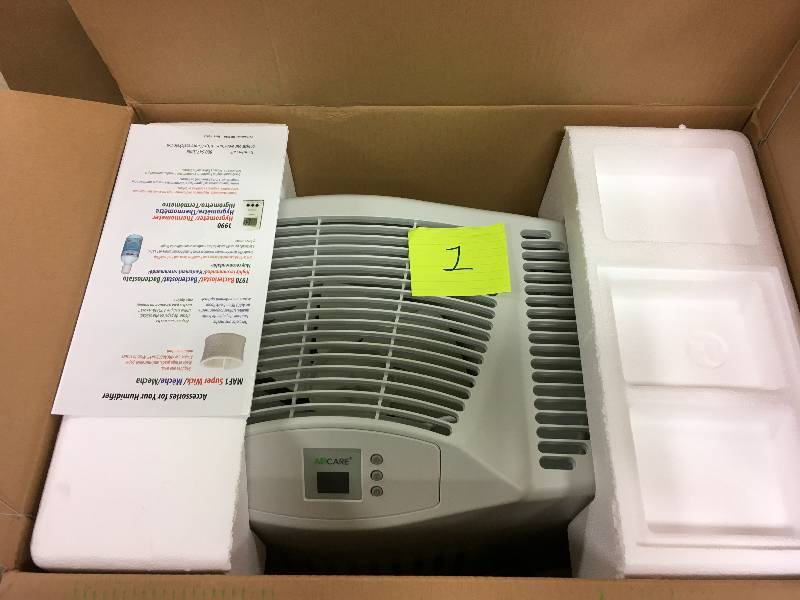 lot 1 image: AIRCARE MA1201 Whole-House Console-Style Evaporative Humidifier, White  not used