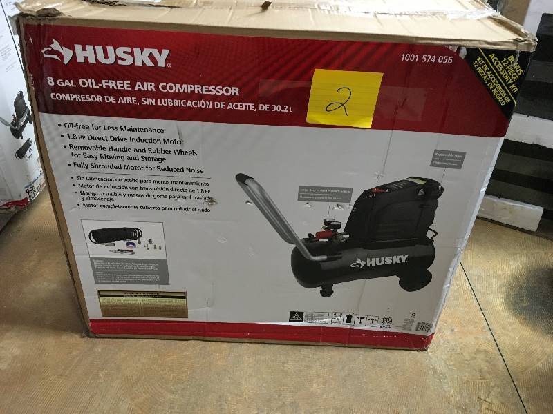Husky 8 Gallon Oil-Free Air Compressor in working conditions