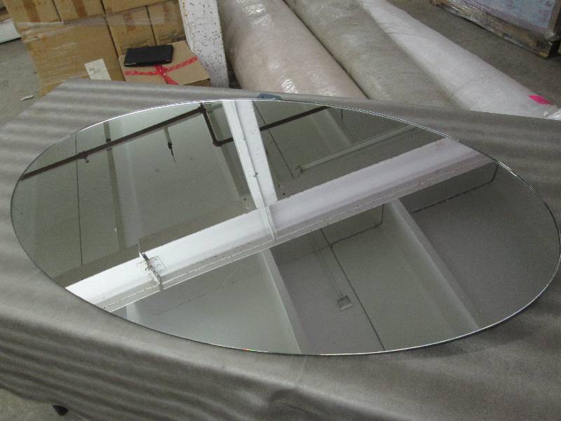 lot 22 image: Oval Mirror 38x22 inches...