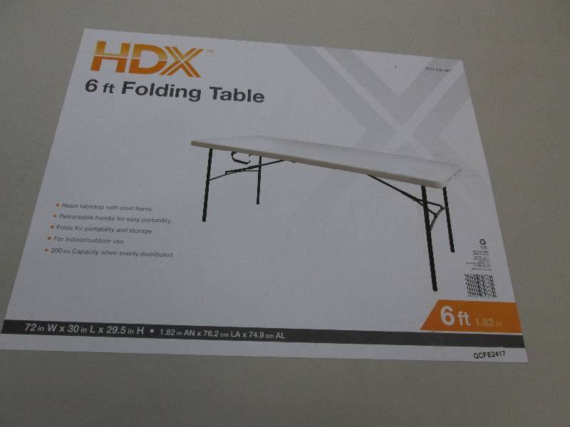 lot 44 image: HDX 6 Foot Folding Table- corner da...