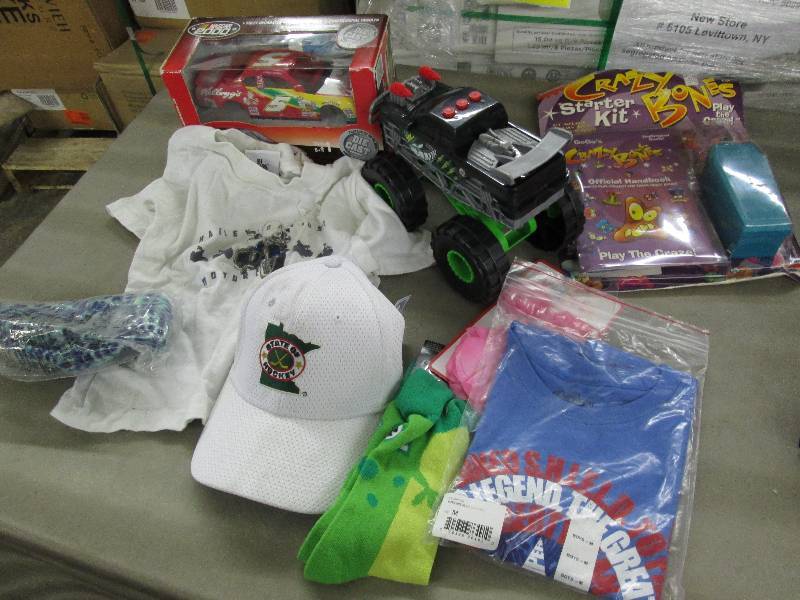 lot 174 image: Model Car, Monster truck, 2 t-Shirt...