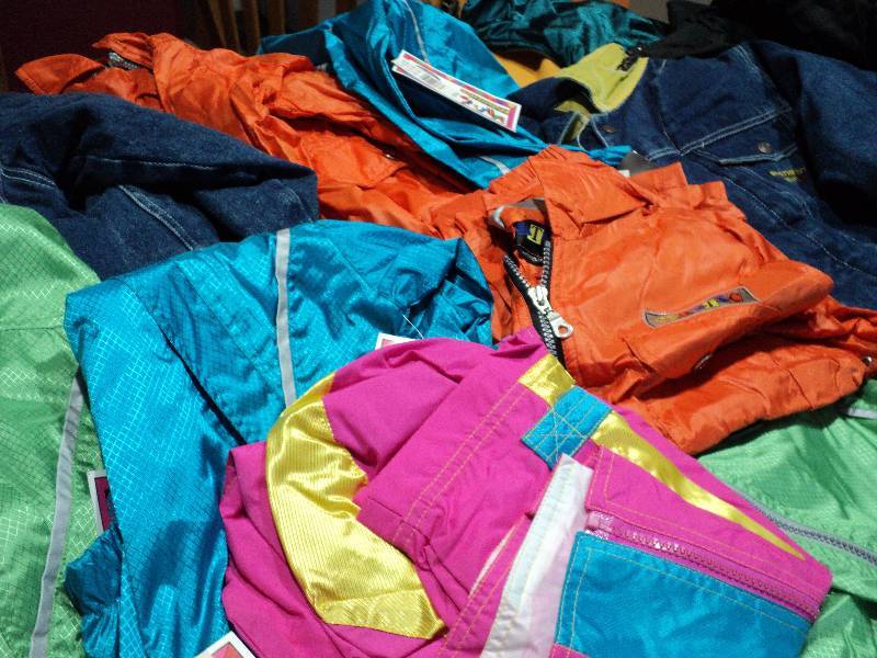 lot 24 image: Girls M and L new jackets in covere...