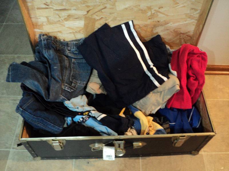 lot 36 image: Foot locker full of boys clothing ...
