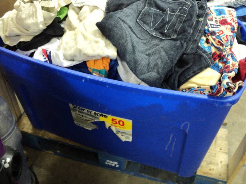 lot 55 image: Large tub of mens and boys clothin...