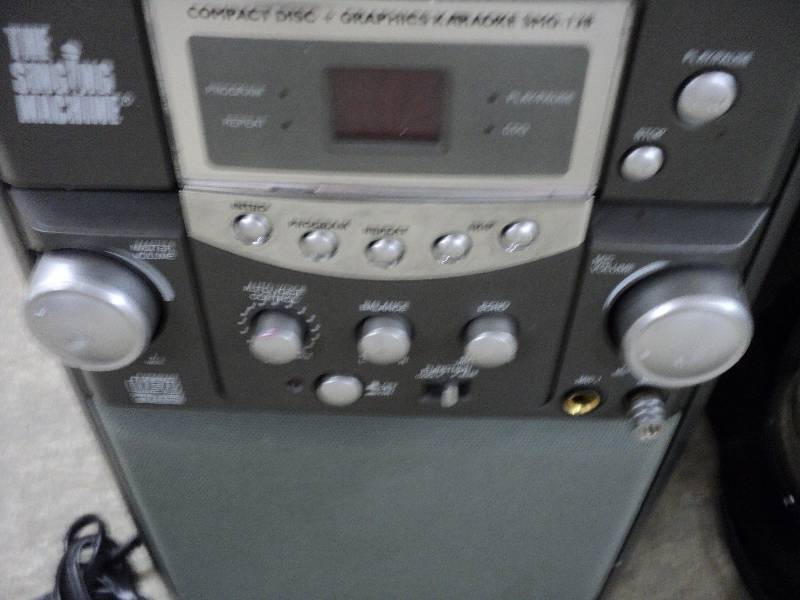 lot 61 image: Singing machine, toys and coffee ma...