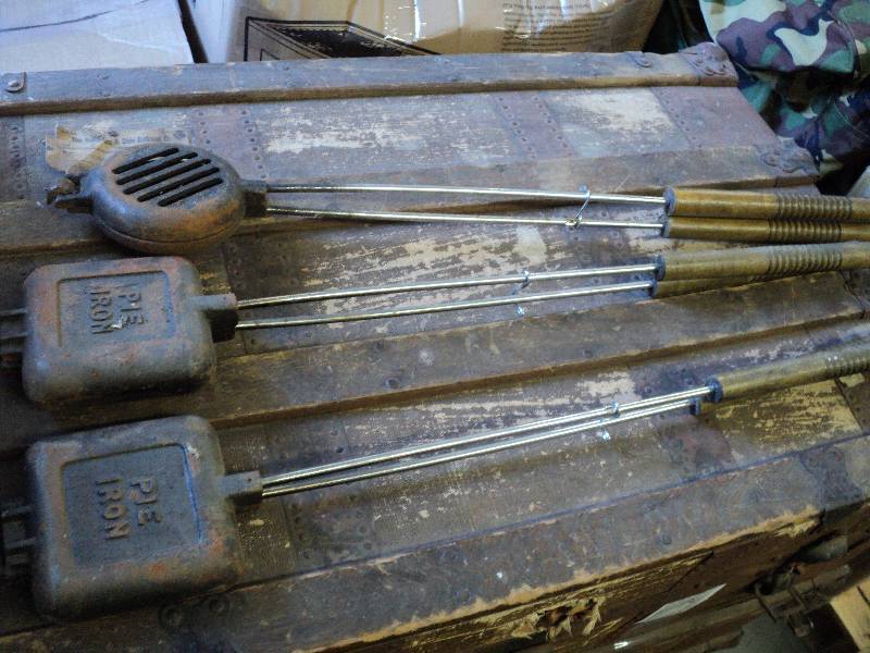 lot 76 image: Cast iron camping and baking items...