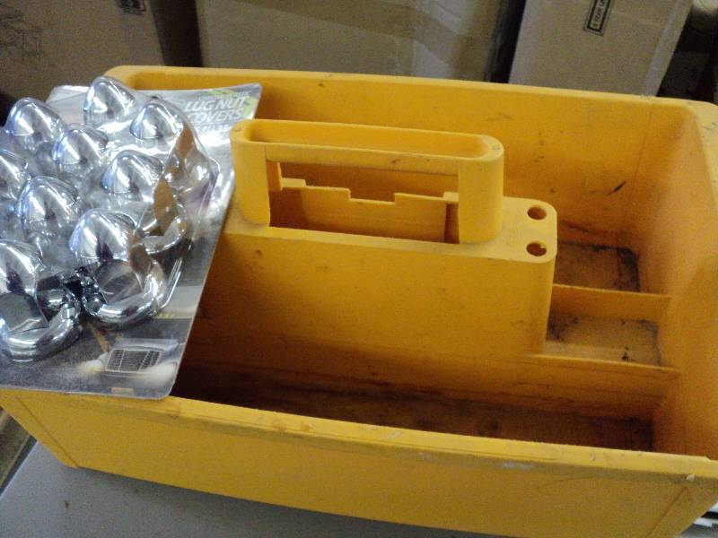 lot 140 image: Tool caddy and lug nut covers...