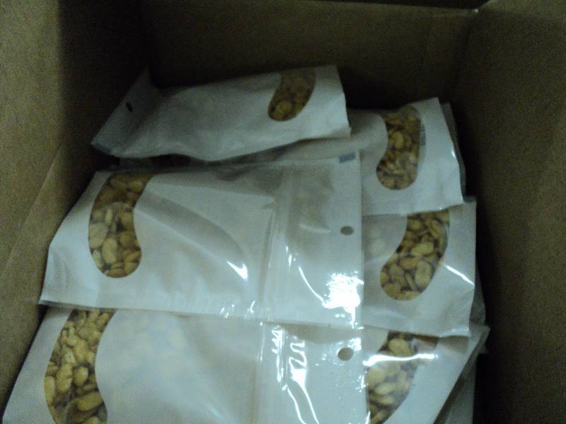 lot 142 image: 24 5 oz. Bags Kala Roasted Garlic F...