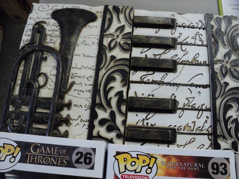 lot 157 image: 2 pictures and Game of Thrones doll...