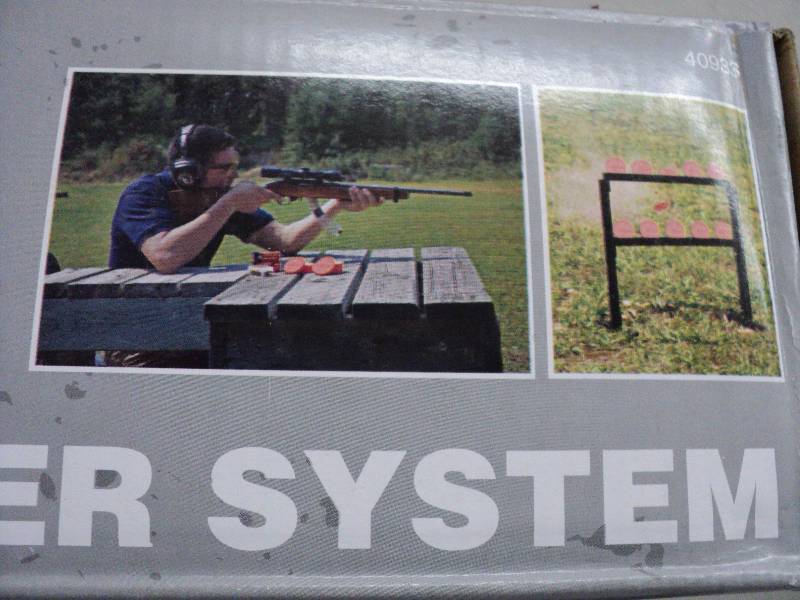 lot 166 image: Set of 2 champion traps and targets...