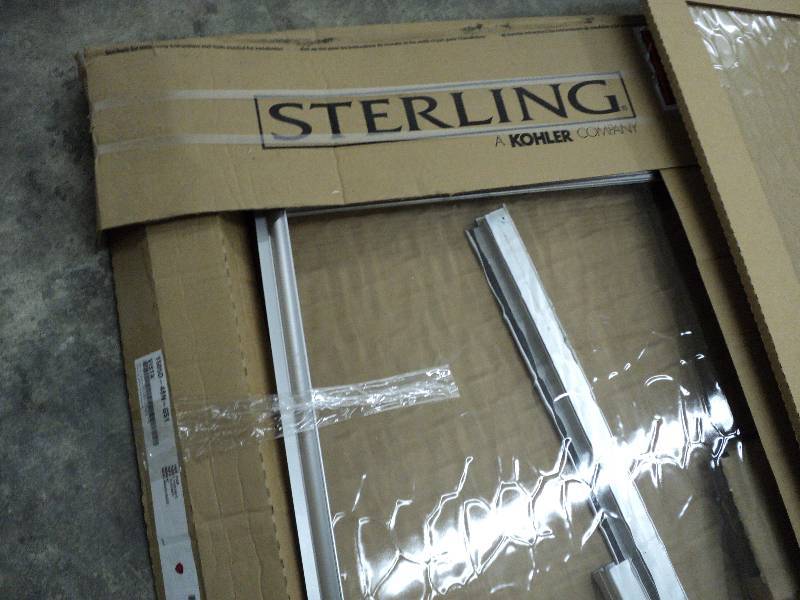 lot 208 image: 2 delta shower doors with assembly ...