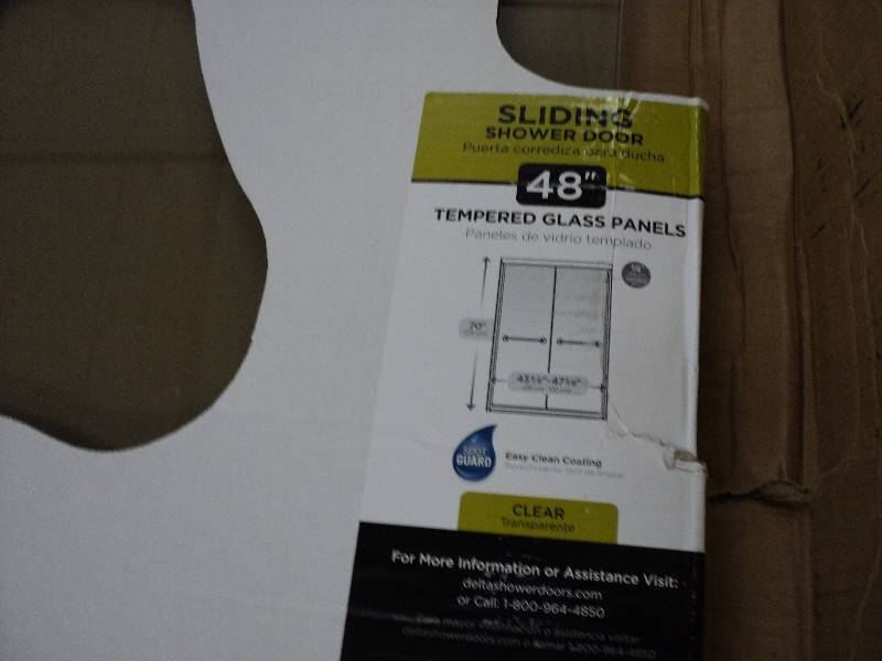 lot 219 image: delta 48 sliding shower doors...