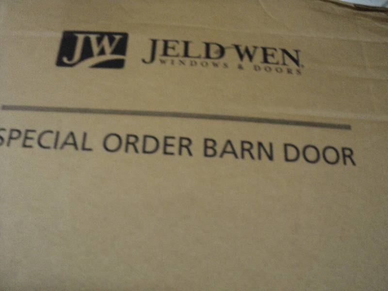 lot 228 image: special order Jeldwen barn door wit...