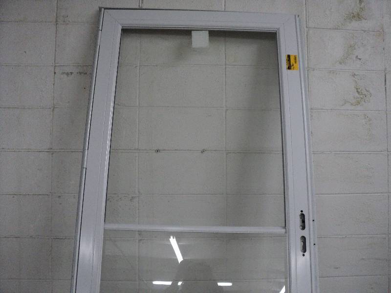 lot 233 image: storm screen door, white...