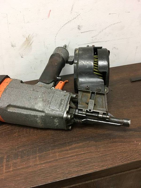lot 9 image: Paslode Wire & Plastic Framing Coil Nailer used good working condition tool