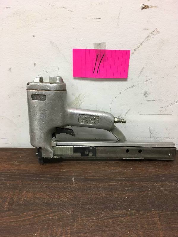 lot 11 image: PASLODE IS A DIVISION OF SIGNODE CORP. FOR SALE IS A PASLODE EM-1699 PNEUMATIC NAIL GUNFRAMING NAILER in working conditions