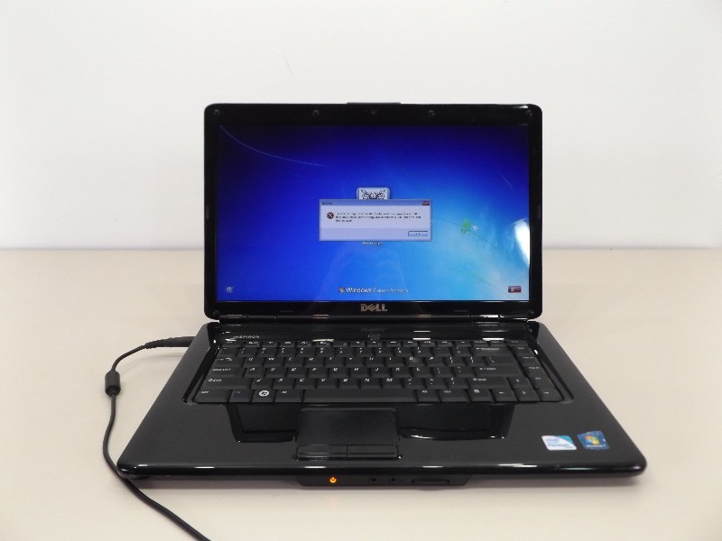lot 16 image: Dell Inspiron 1545 Laptop and Charger