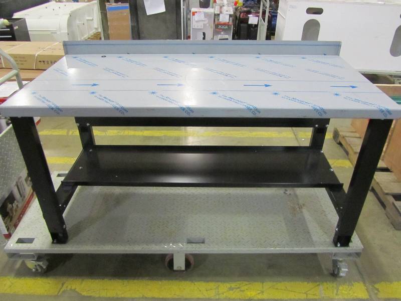 lot 6 image: Borroughs 28 in. x 60 in. Adjustable Height Work Bench