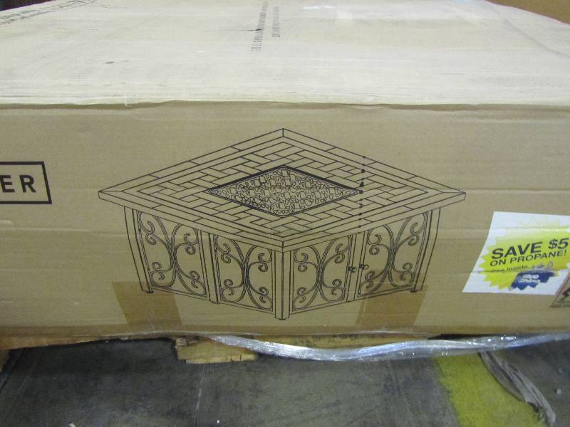 lot 63 image: Endless Summer 41 in. Steel LP Fire Pit with Slate Tile and Wrought Iron Panels