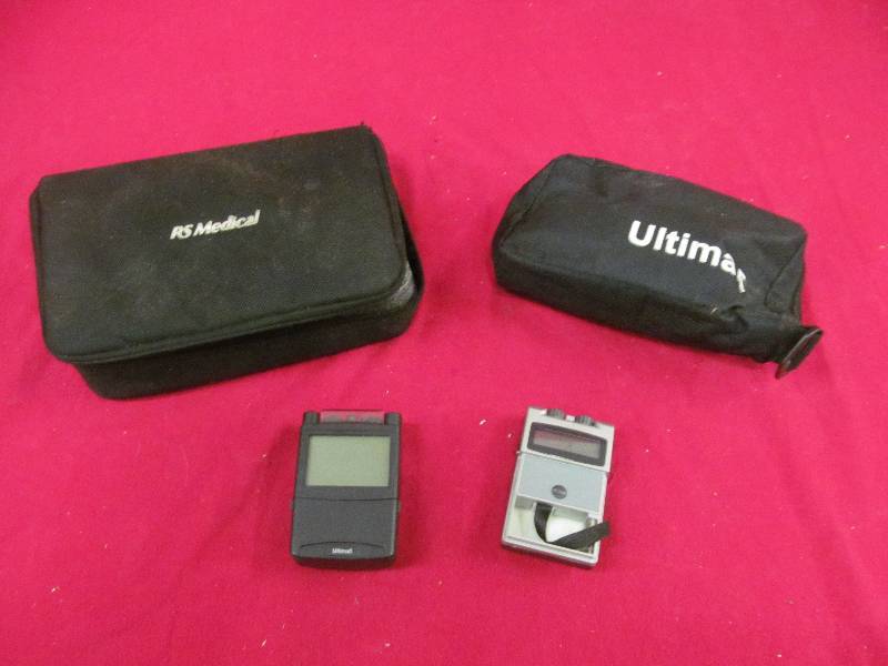 lot 91 image: wire leads, RS battery charger,Ultima pain management device