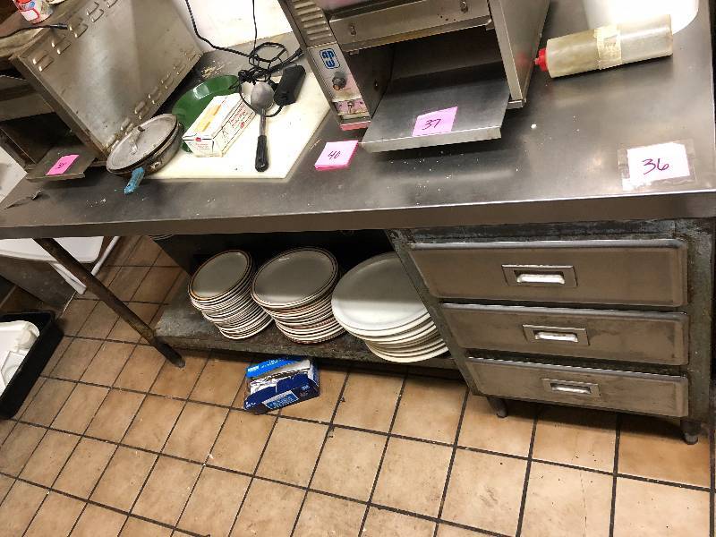 Stainless Steel Table with 3 drawers (contents not included)